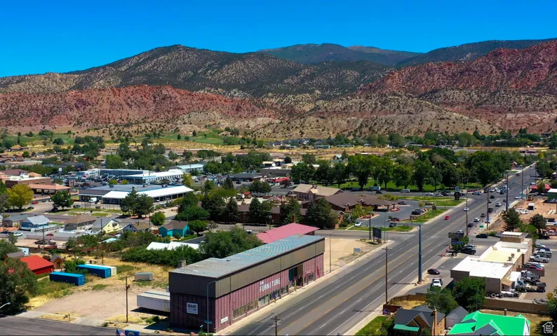 Aerial view of residential area with a mountainous background