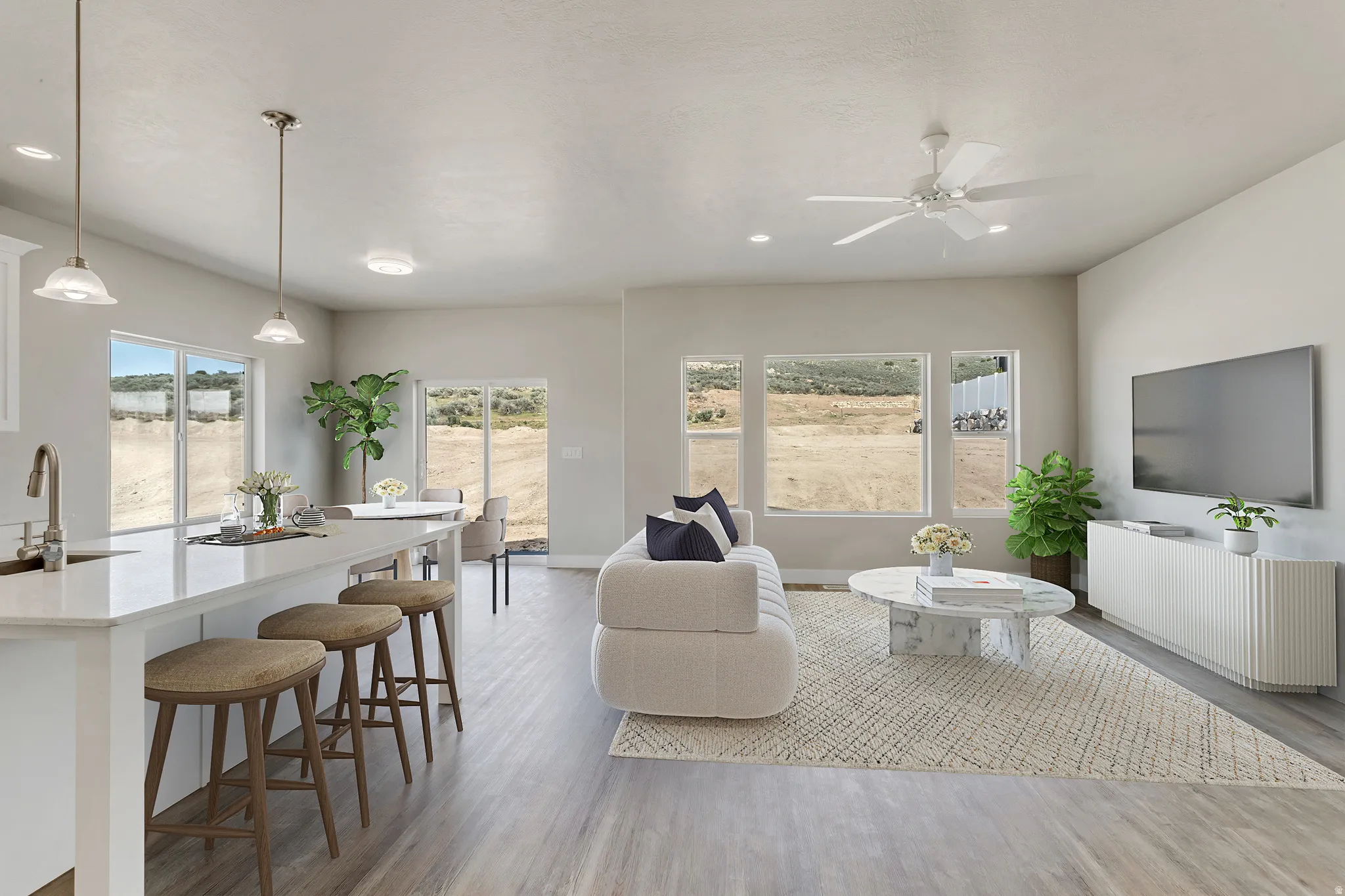 Living room with light wood-type flooring, ceiling fan, and recessed lighting