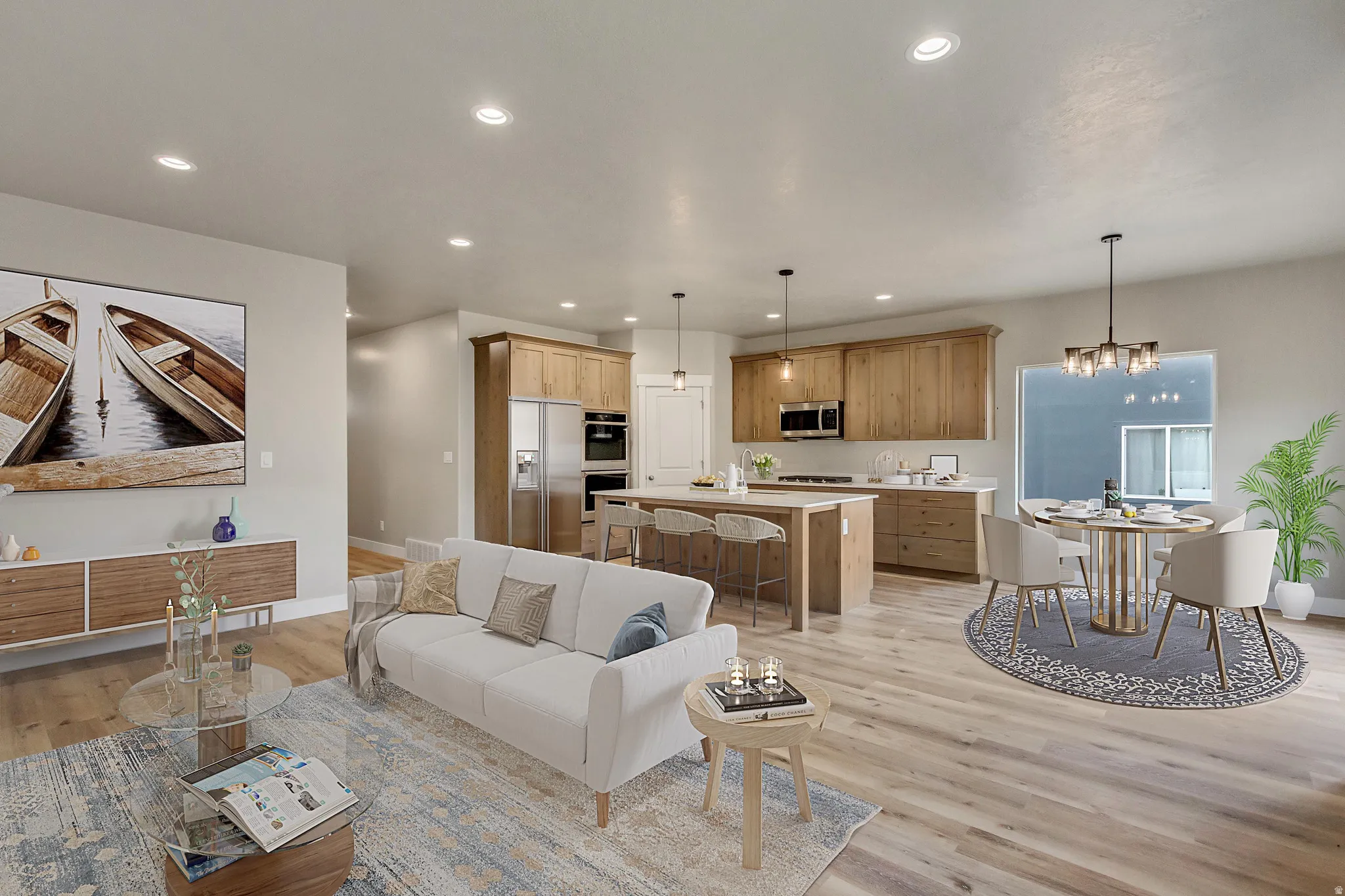 Living area with light wood-type flooring, a chandelier, and recessed lighting
