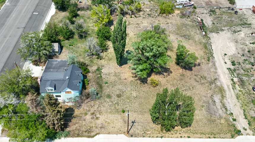 View from above of property. HOME ON CORNER IS NOT INCLUDED.