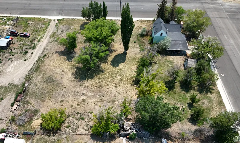 Aerial view of property and surrounding area. HOME ON CORNER IS NOT INCLUDED.