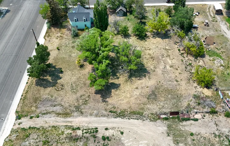 Aerial overview of property's location. HOME ON CORNER IS NOT INCLUDED.