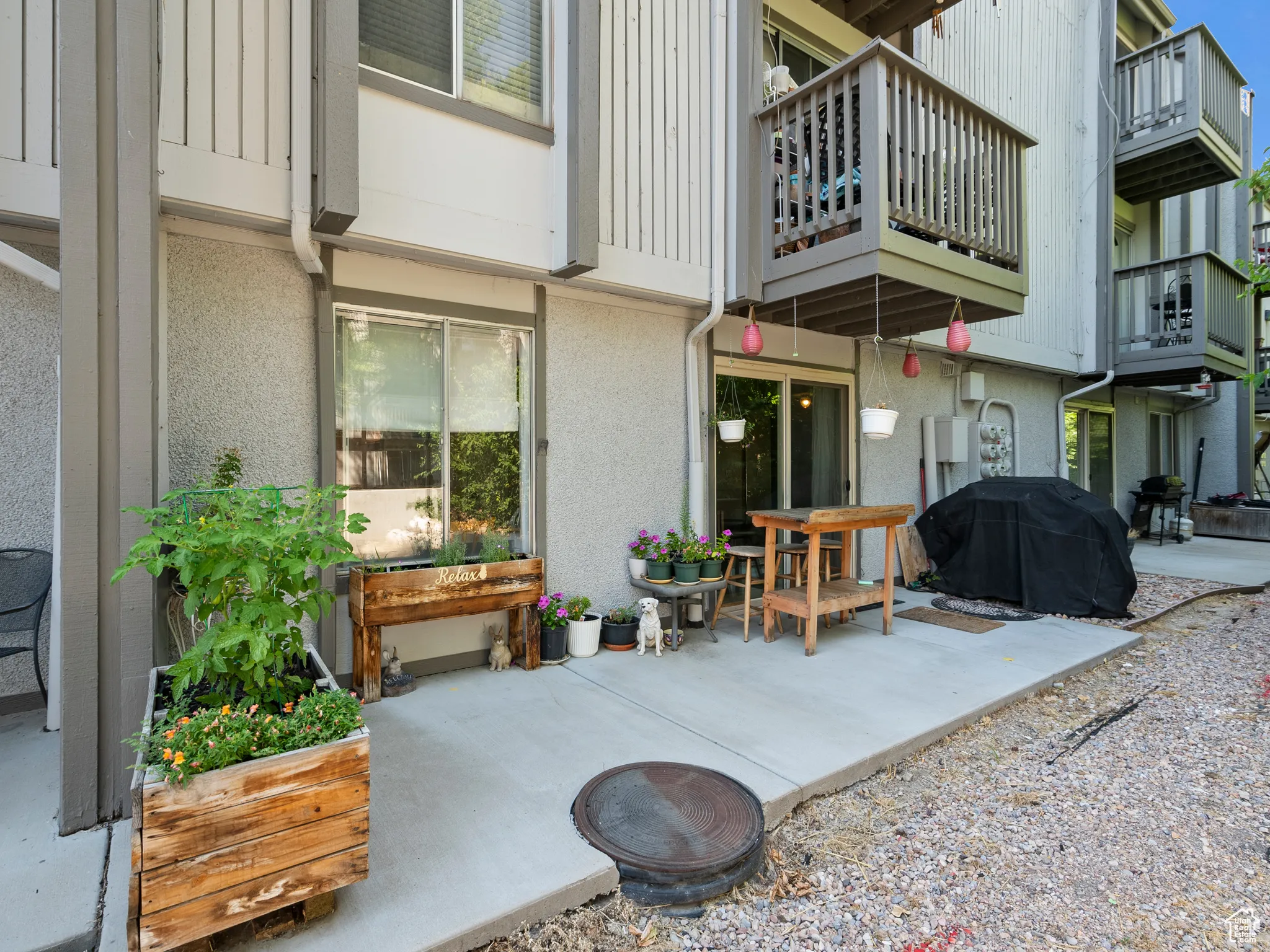 View of patio featuring a grill