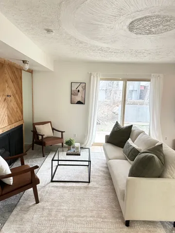 Living area with a textured ceiling