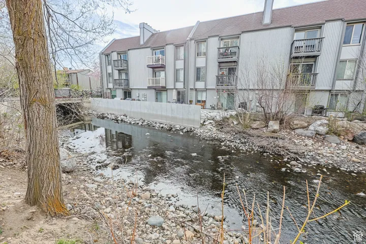 View of property's community with a water view