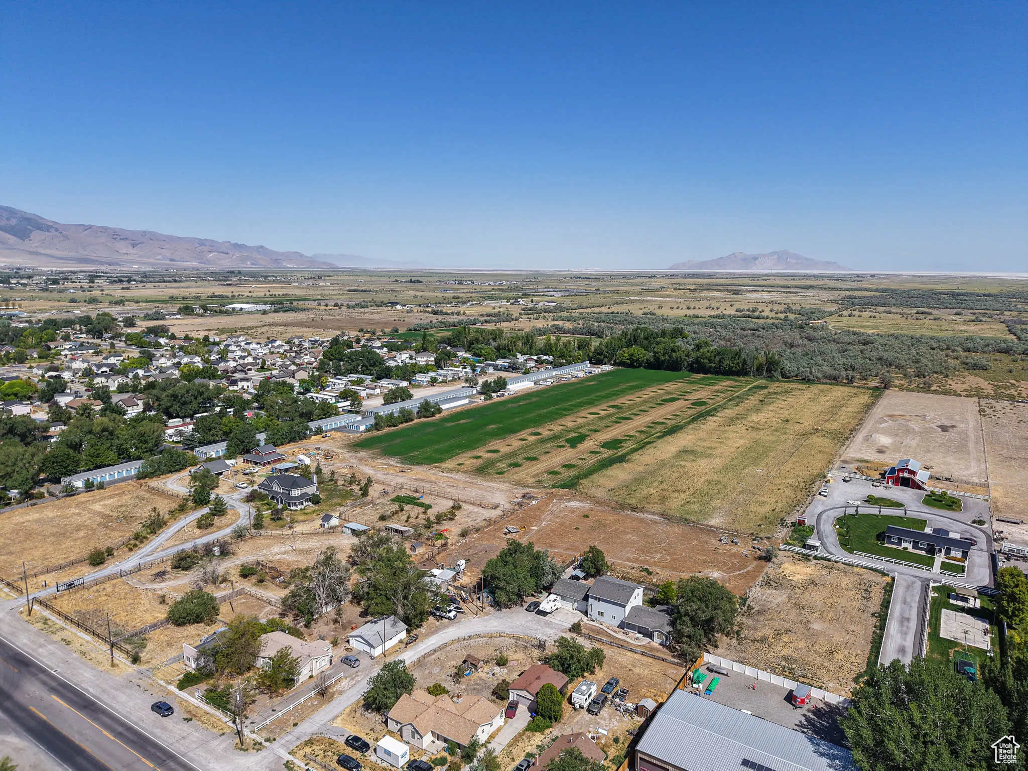 View of property location featuring a mountain backdrop and rural landscape