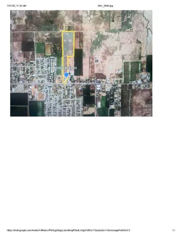 Aerial map of property and surrounding area featuring property boundaries highlighted