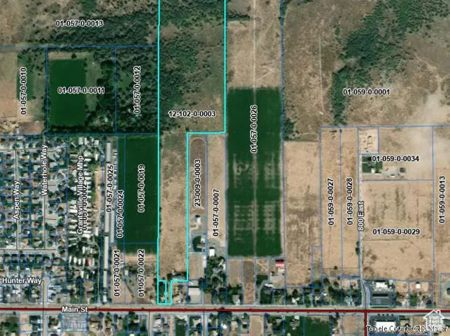 Aerial overview of property's location with property parcel outlined