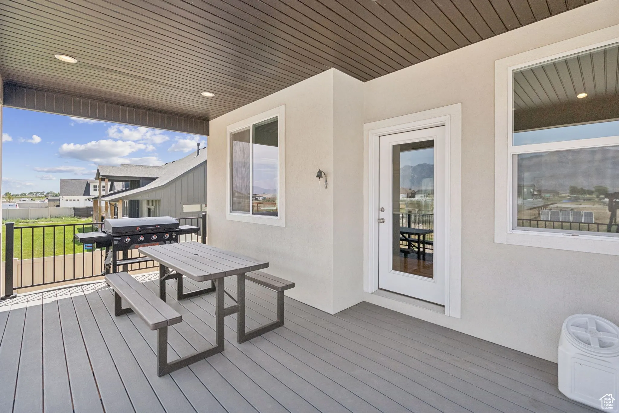 Wooden deck featuring grilling area