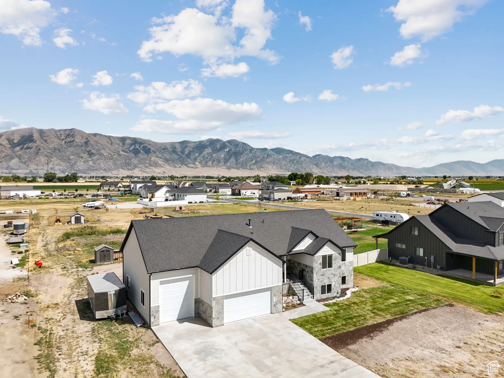View of mountain backdrop with nearby suburban area