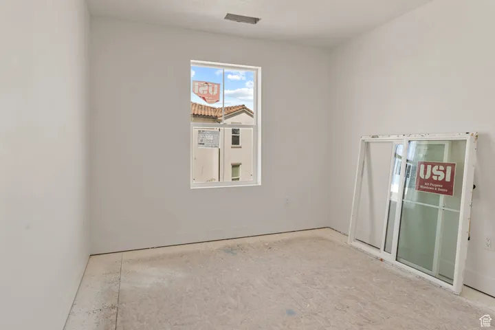 Spare room with baseboards