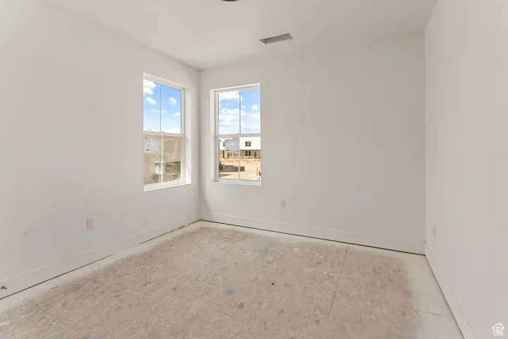 Empty room with baseboards