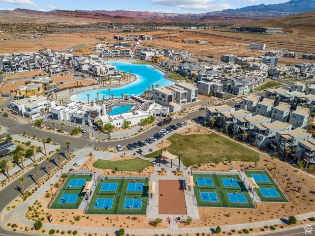 Bird's eye view of a mountain backdrop and a pool area