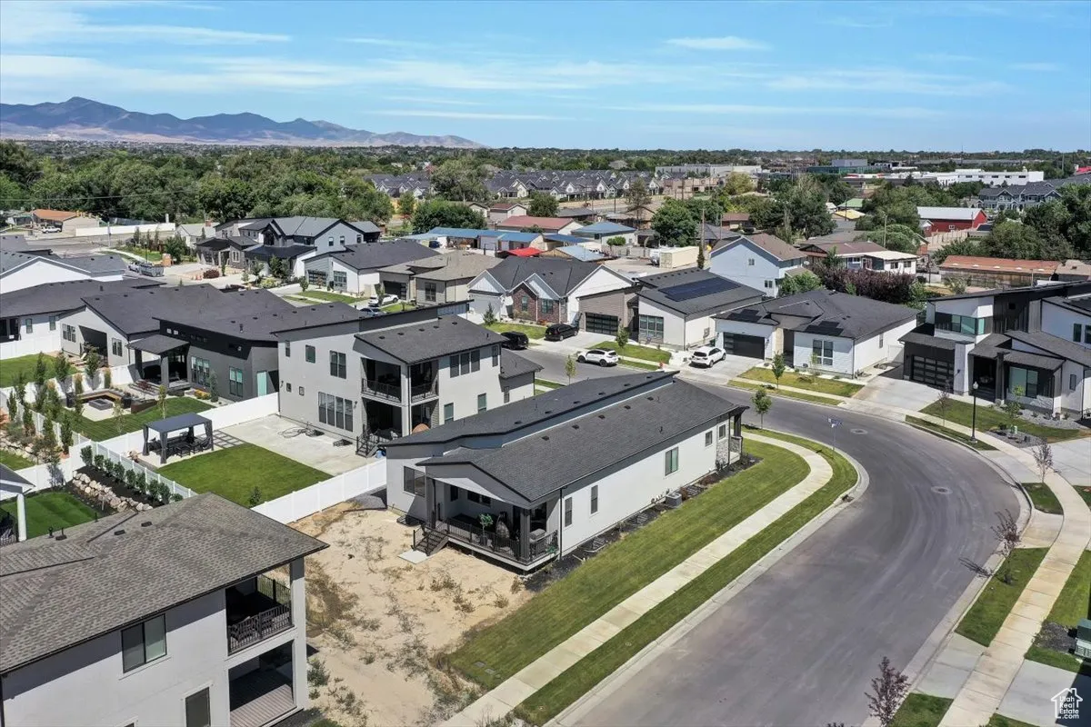 Aerial view of residential area with a mountainous background