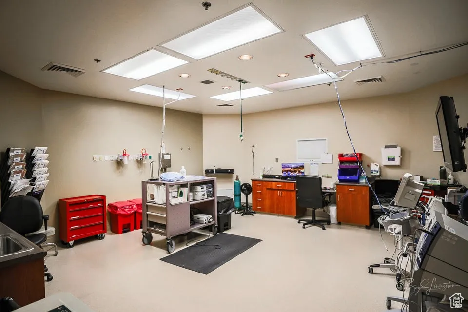 Office space featuring finished concrete floors