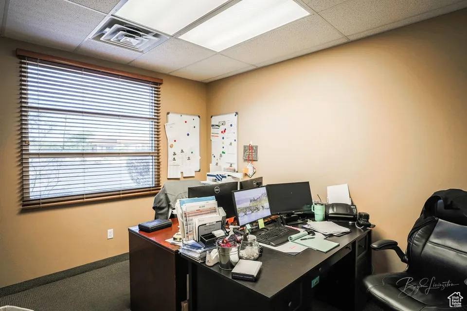 Office space featuring a drop ceiling