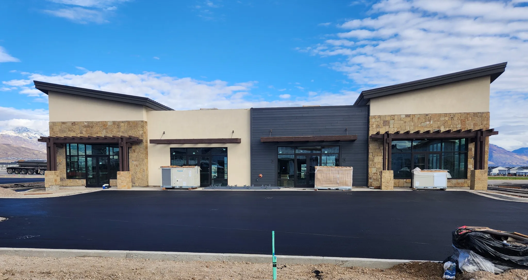 View of commercial location with a mountain view