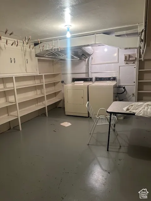 Finished below grade area featuring washer and dryer
