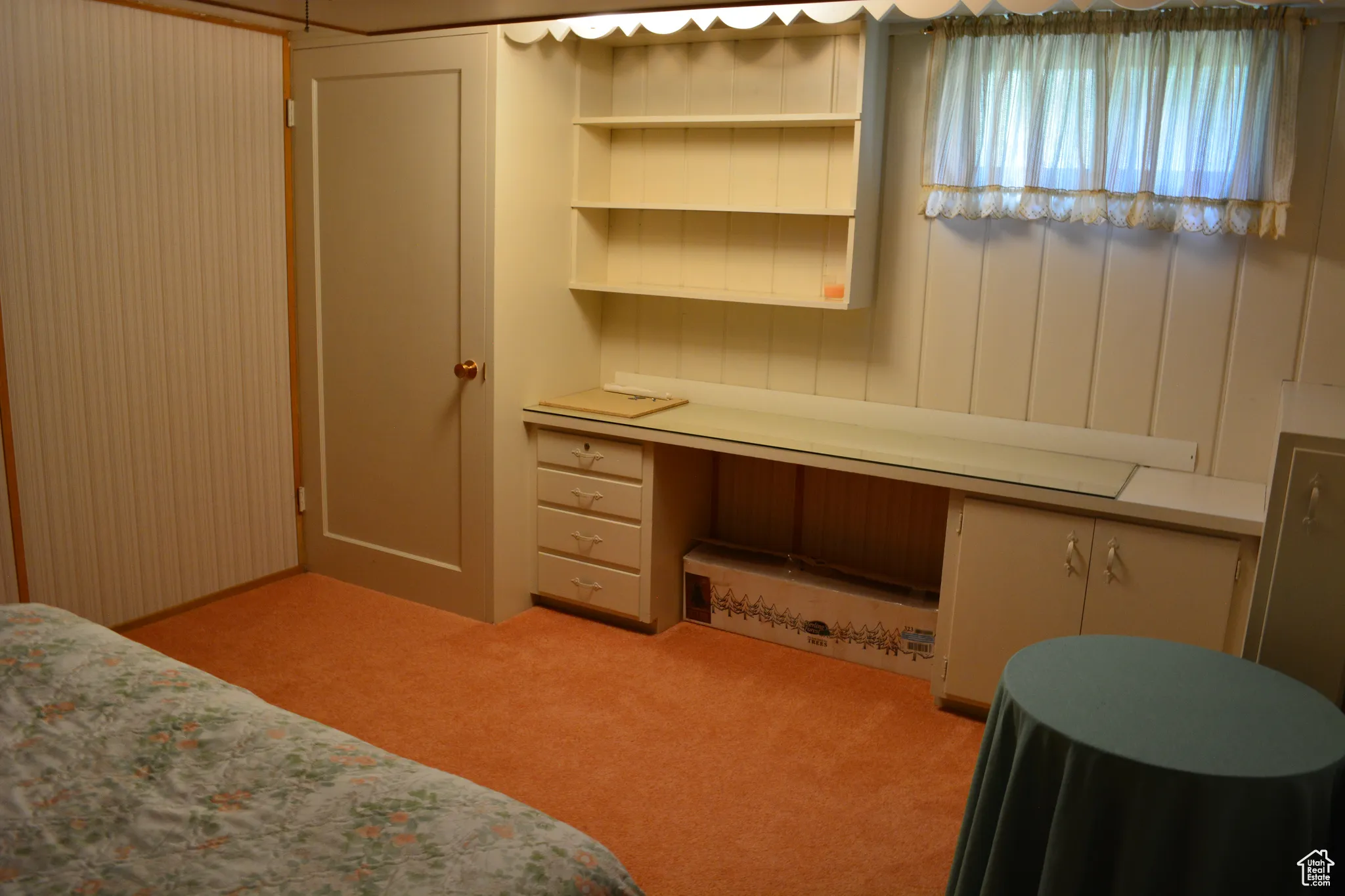 Bedroom with light carpet