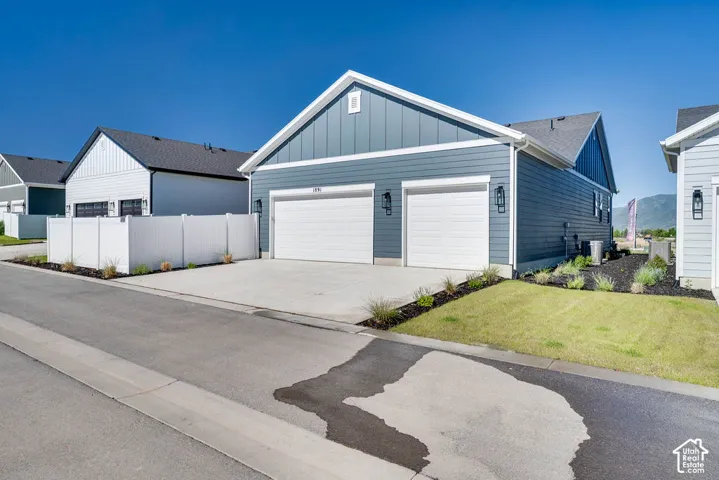 Contemporary exterior featuring blue siding and white trim