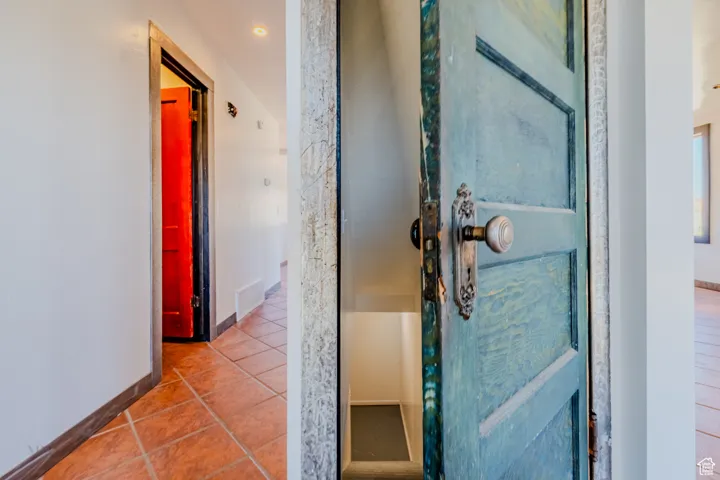 Bathroom with tile patterned floors and recessed lighting