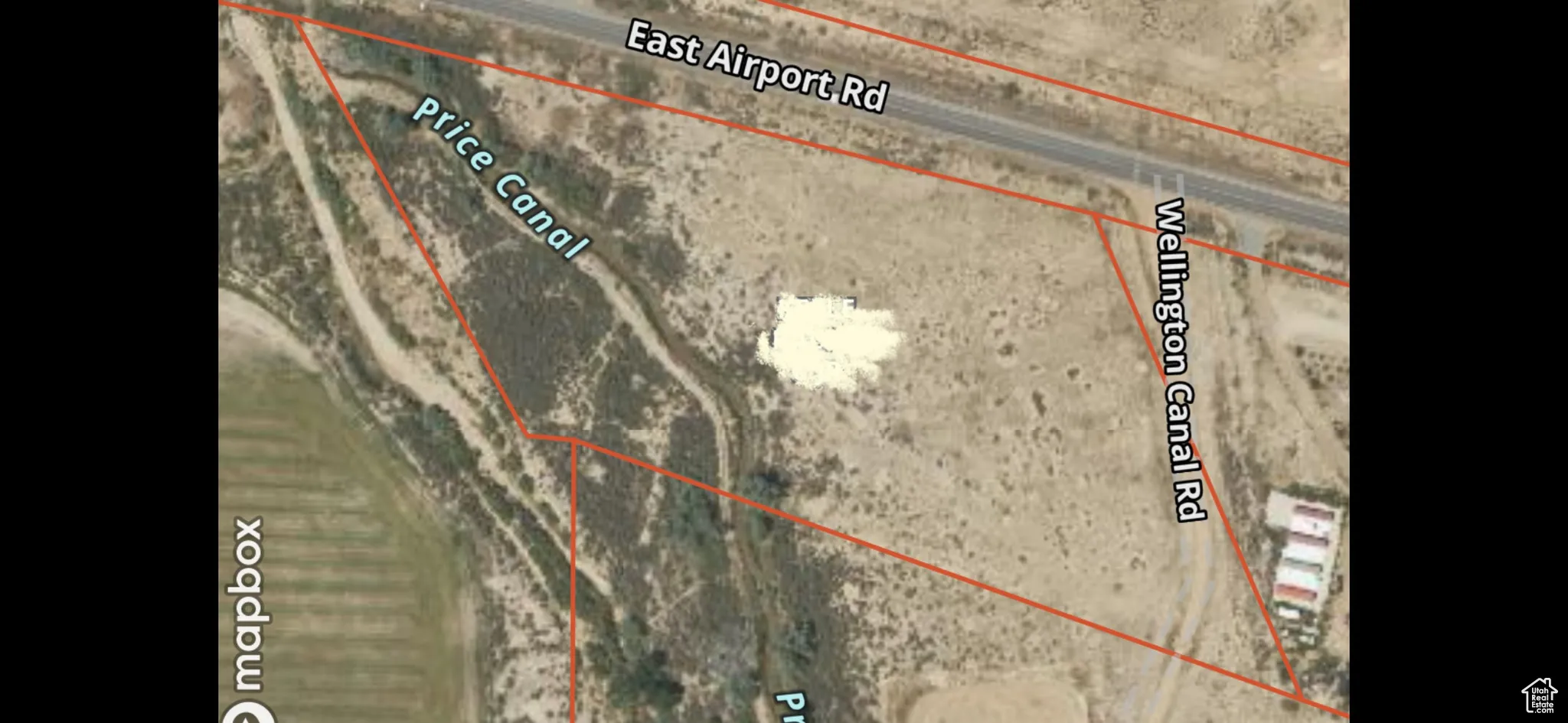 Aerial map of property and surrounding area with property boundaries highlighted