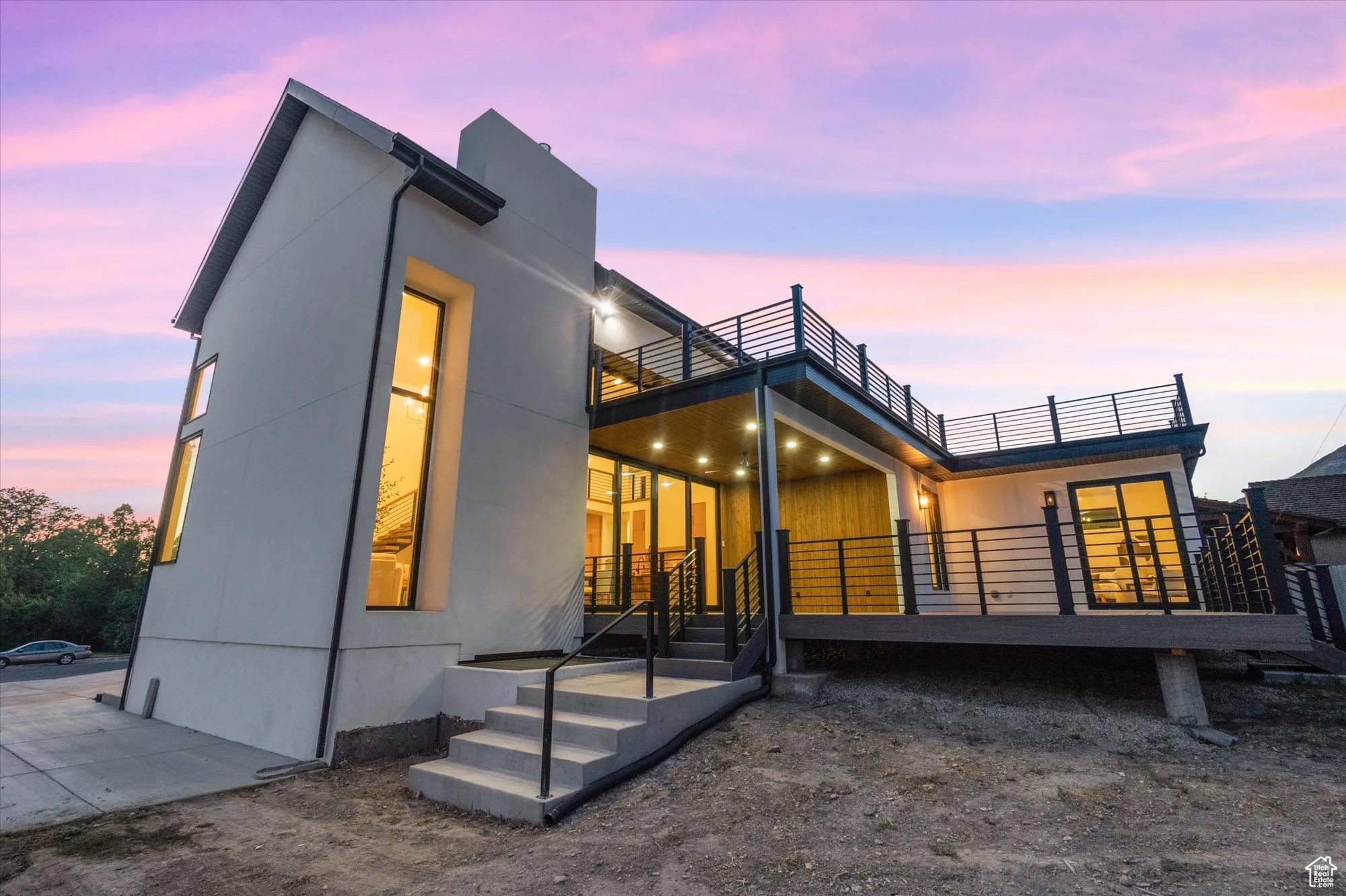 Rear view of house with a balcony