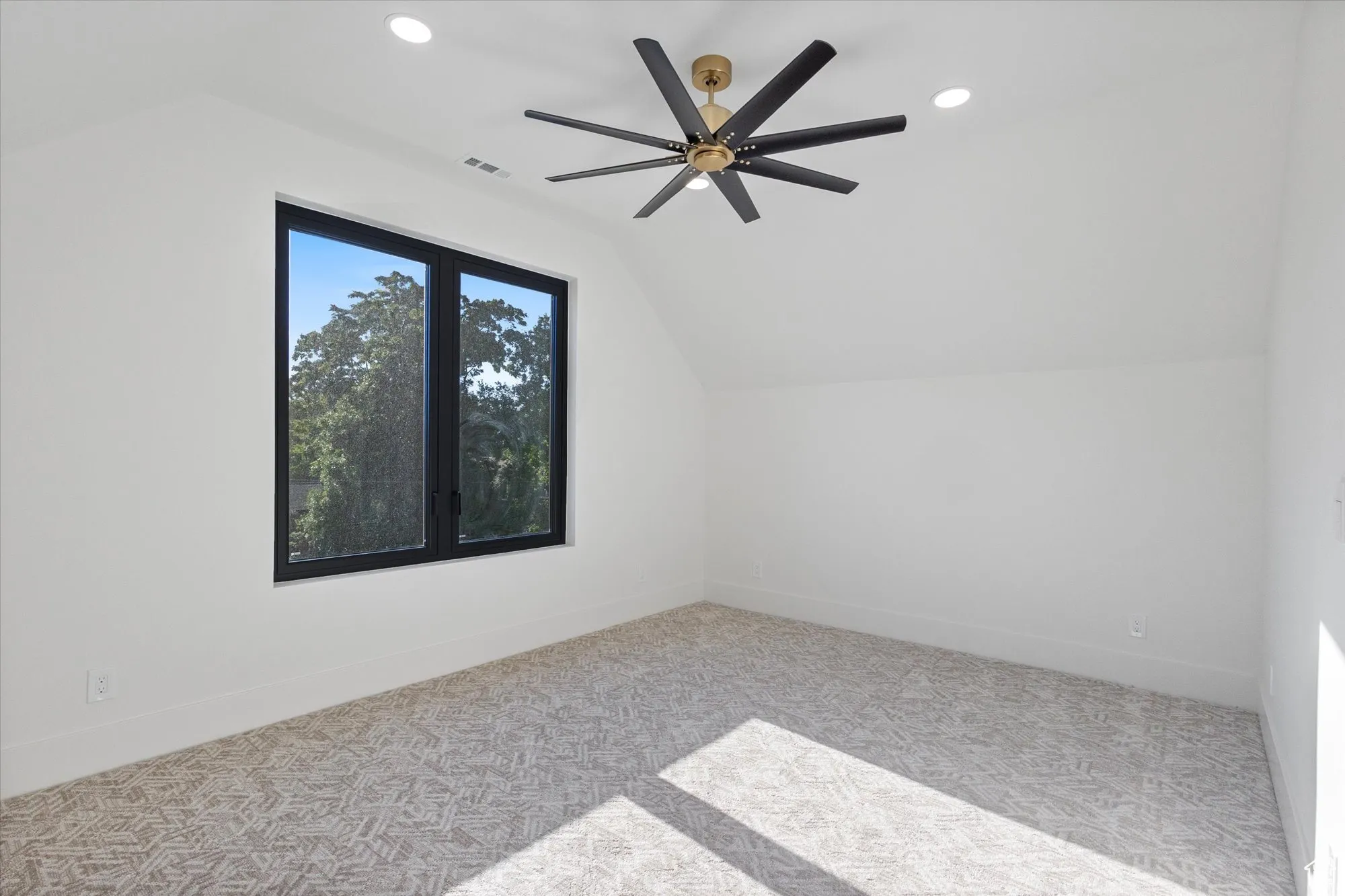 Additional living space with lofted ceiling, carpet flooring, recessed lighting, and ceiling fan