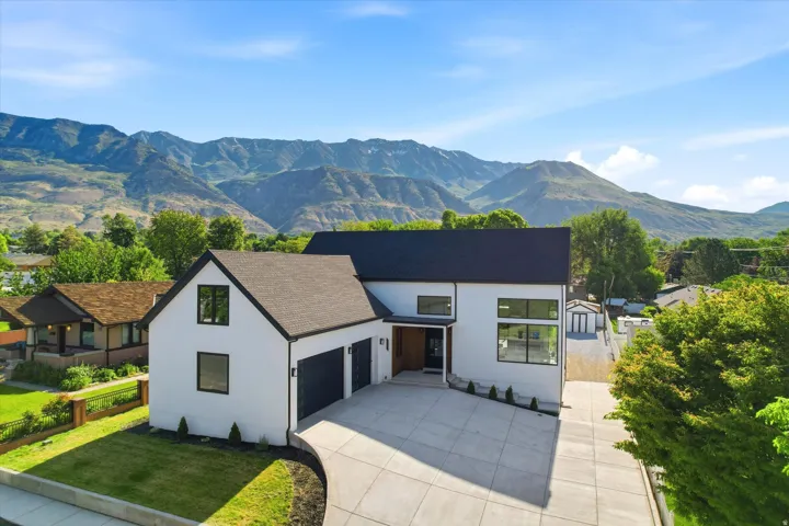 Modern architecture with a white stucco exterior and black trim