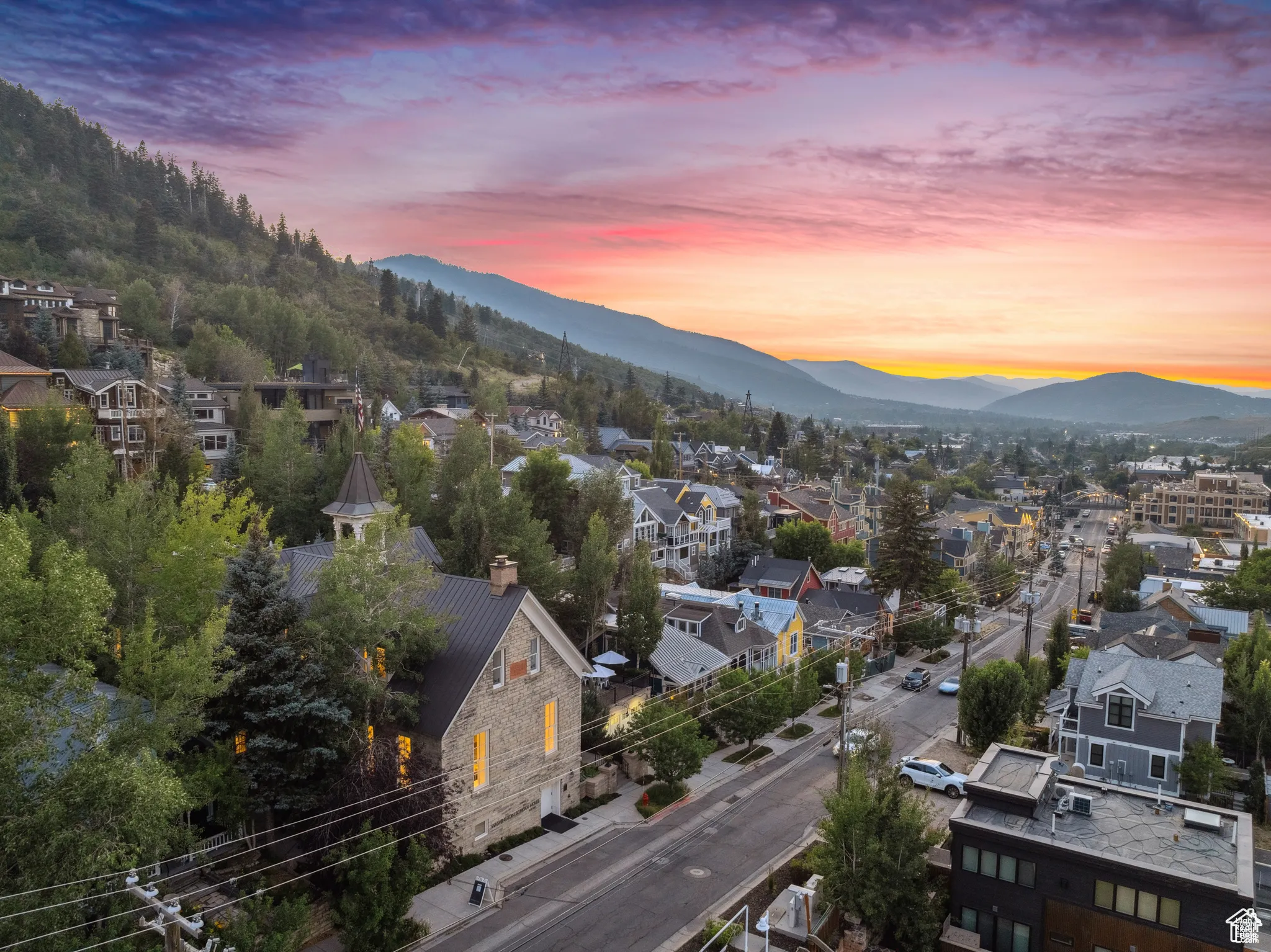 Aerial view at dusk of a mountain view and a residential view