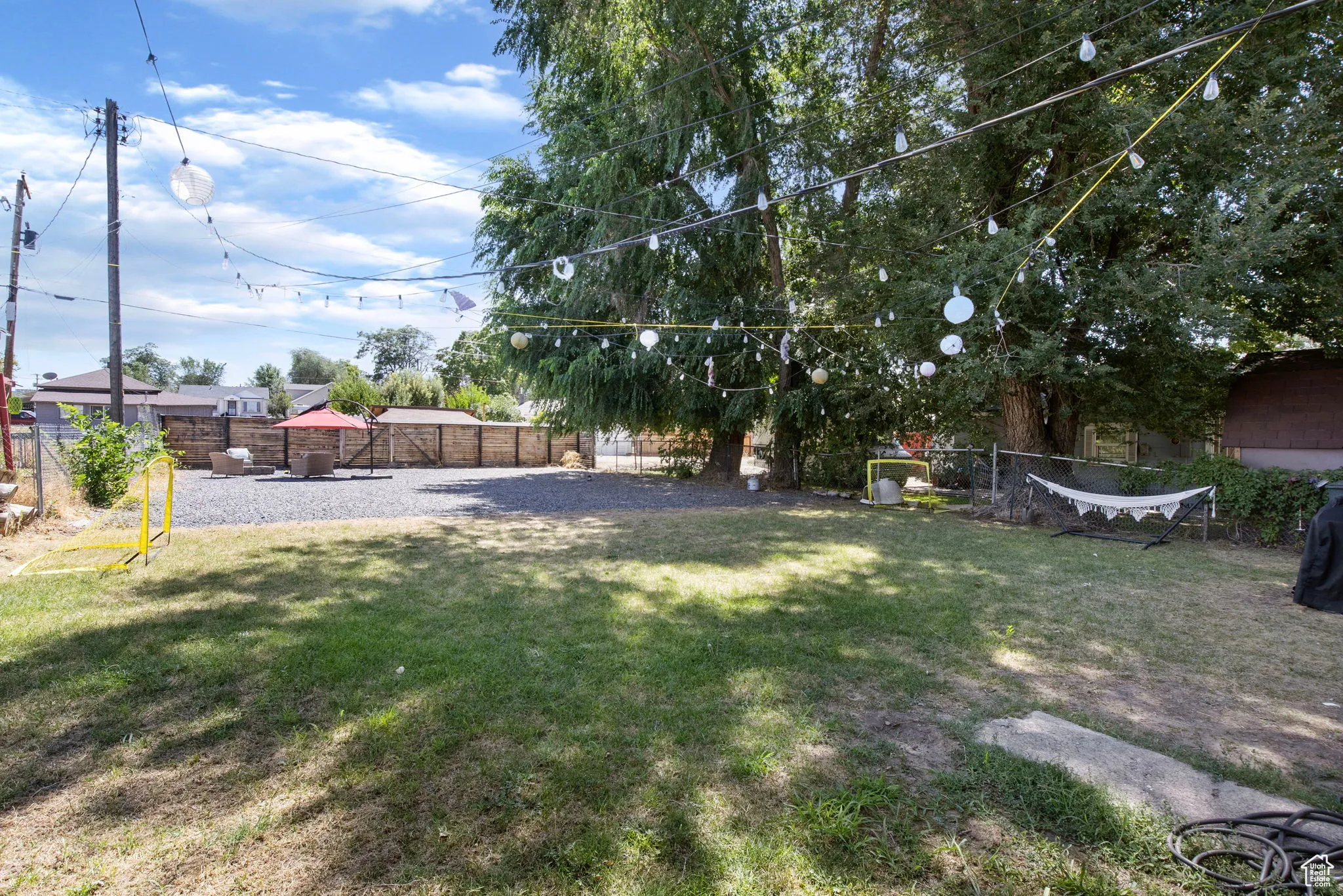 View of fenced backyard