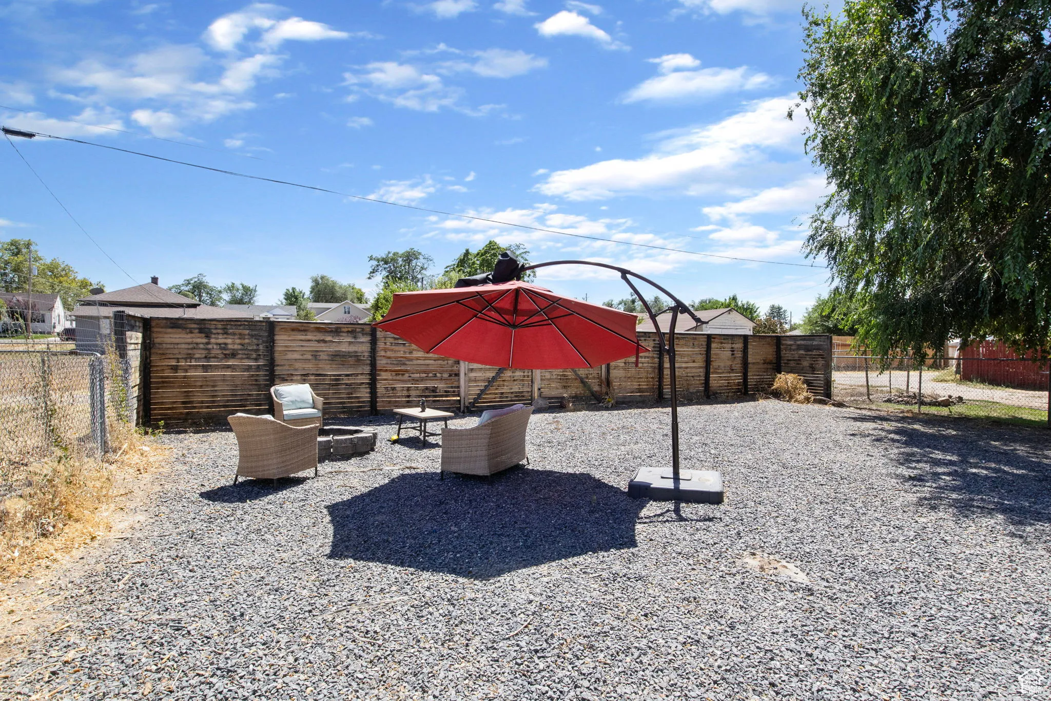 View of fenced backyard