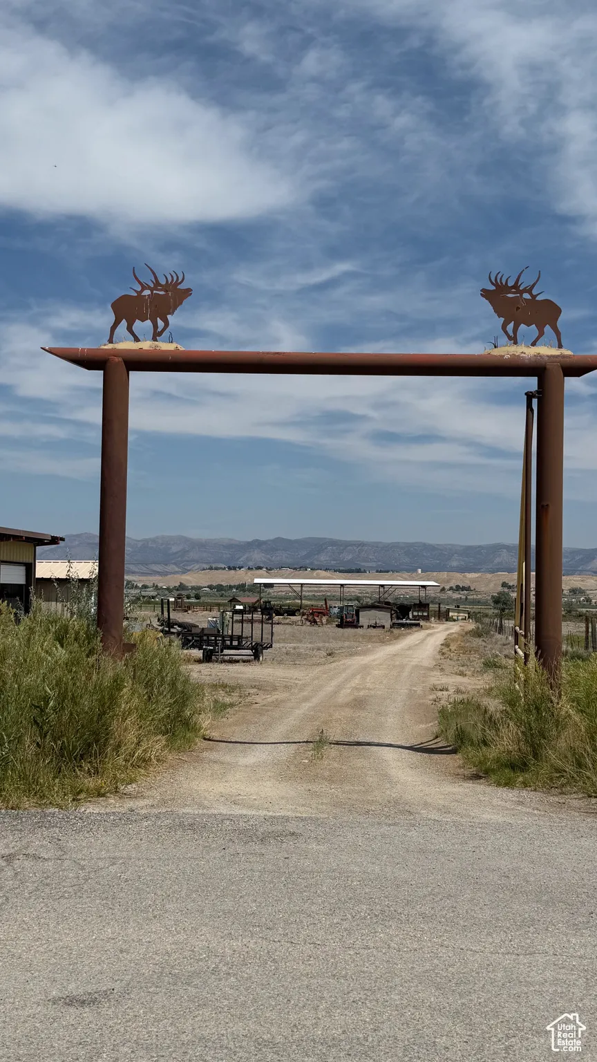 Water view with rural landscape and a mountainous background
