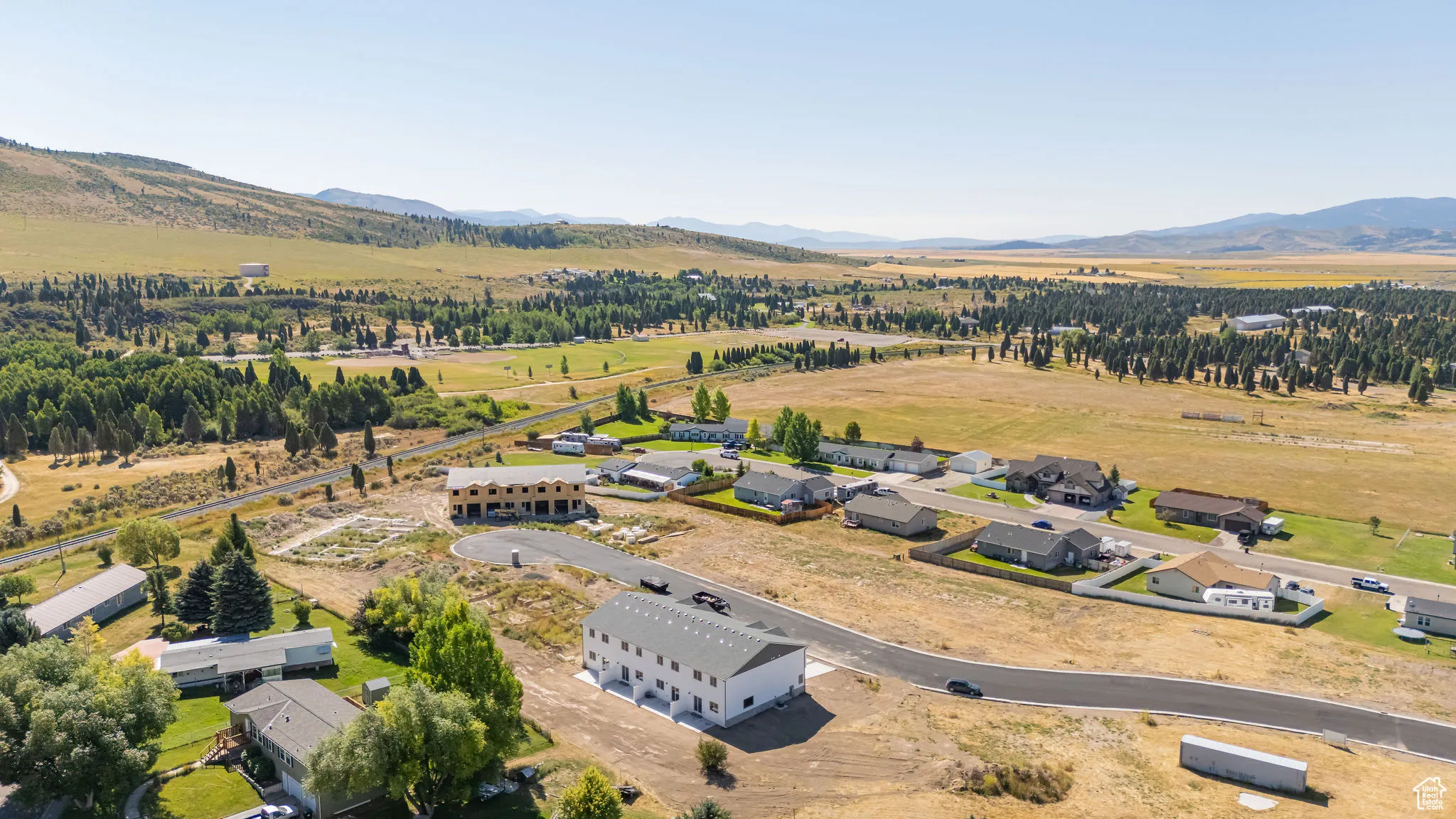 Overview of rural landscape featuring mountains