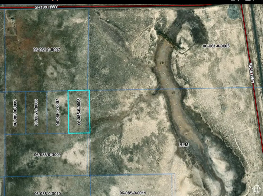 Aerial overview of property's location with property parcel outlined