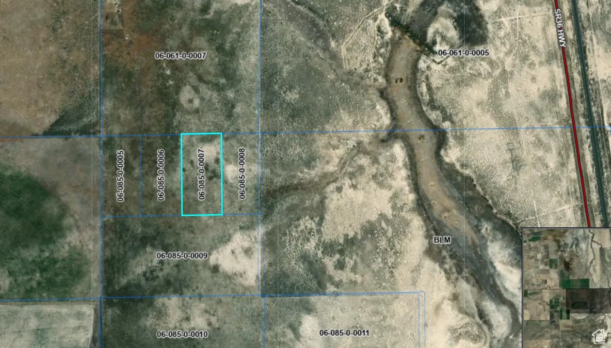 Aerial overview of property's location featuring property parcel outlined