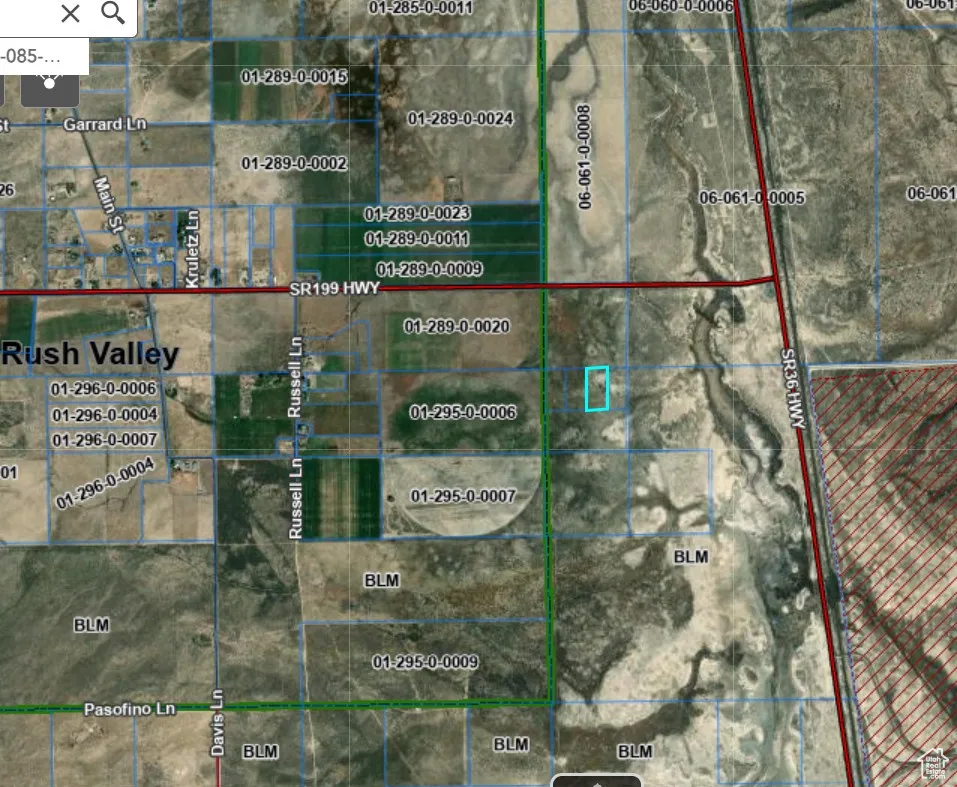 Aerial map of property and surrounding area featuring property boundaries highlighted