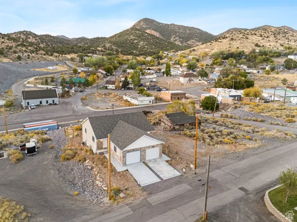 Aerial view of residential area with a mountain backdrop