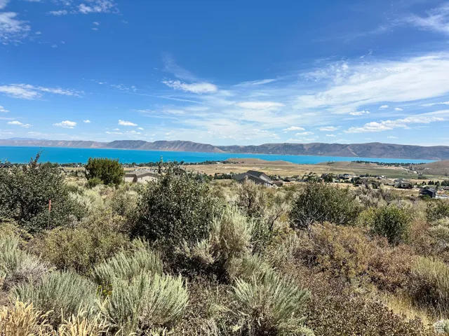 Mountain view featuring a nearby body of water