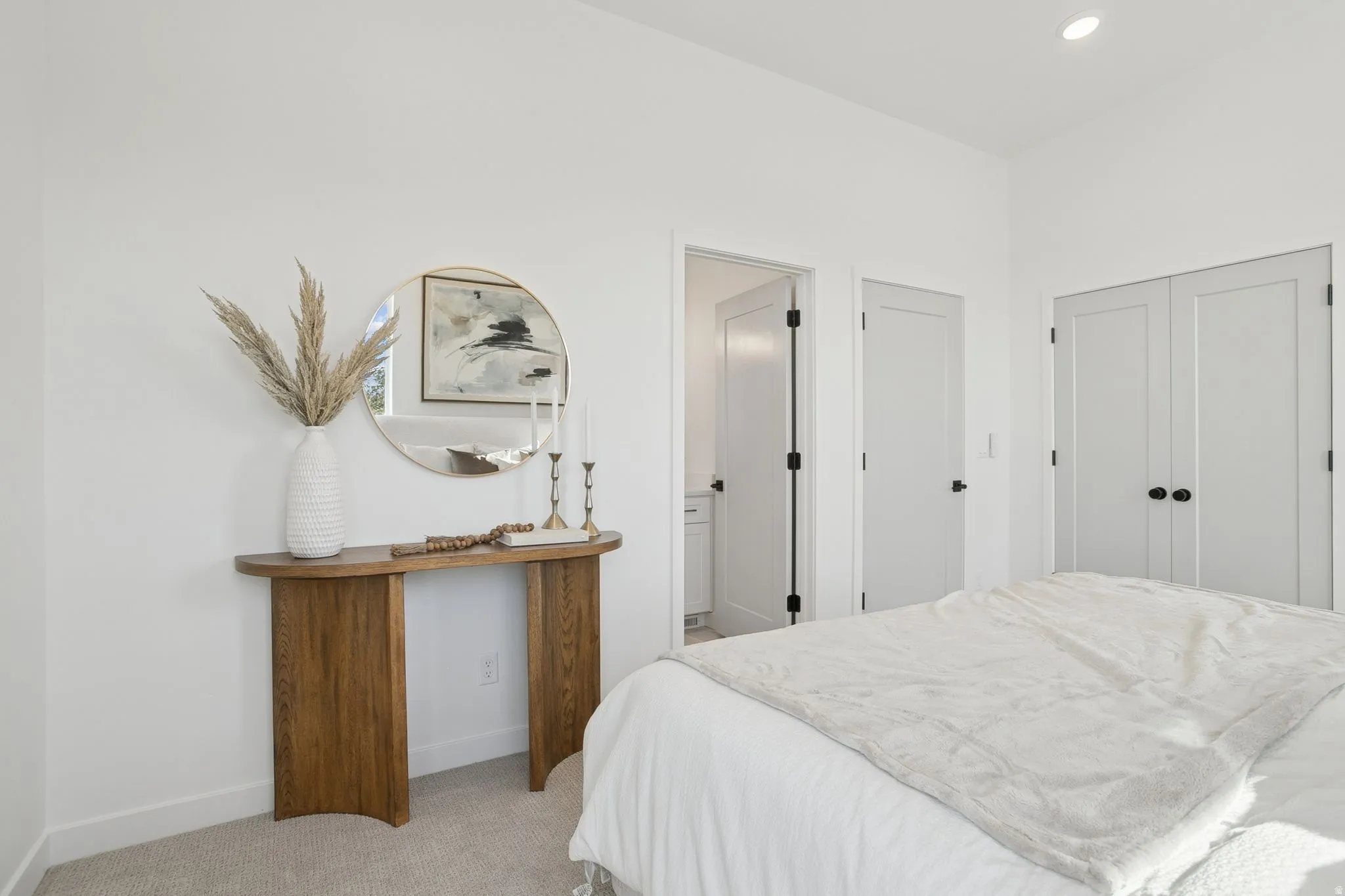 Bedroom featuring carpet flooring, a closet, and recessed lighting