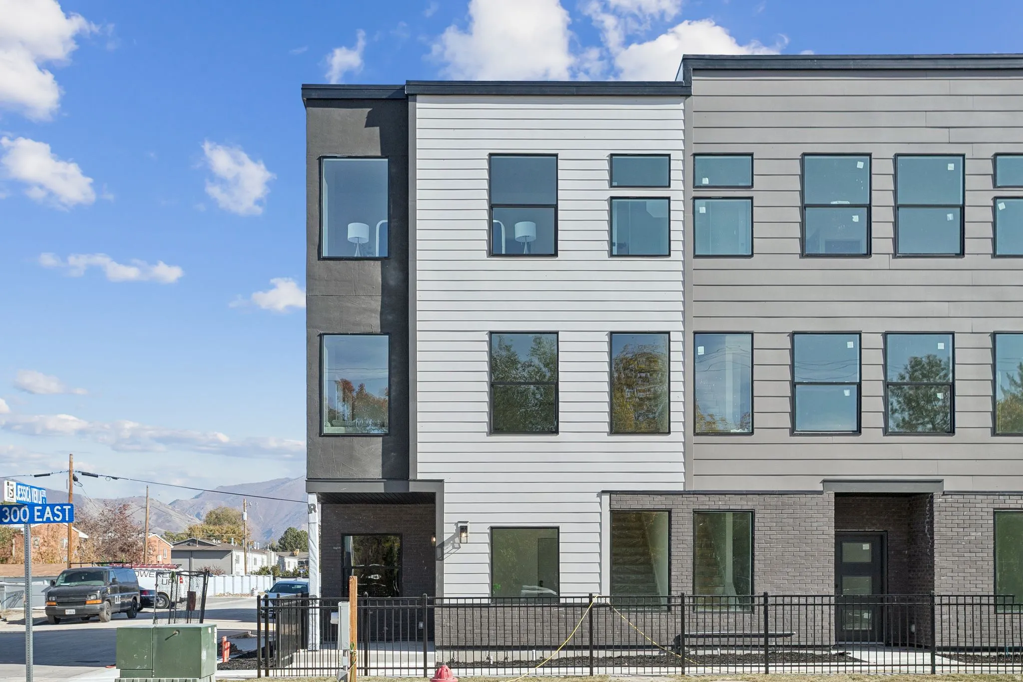 View of property with a fenced front yard