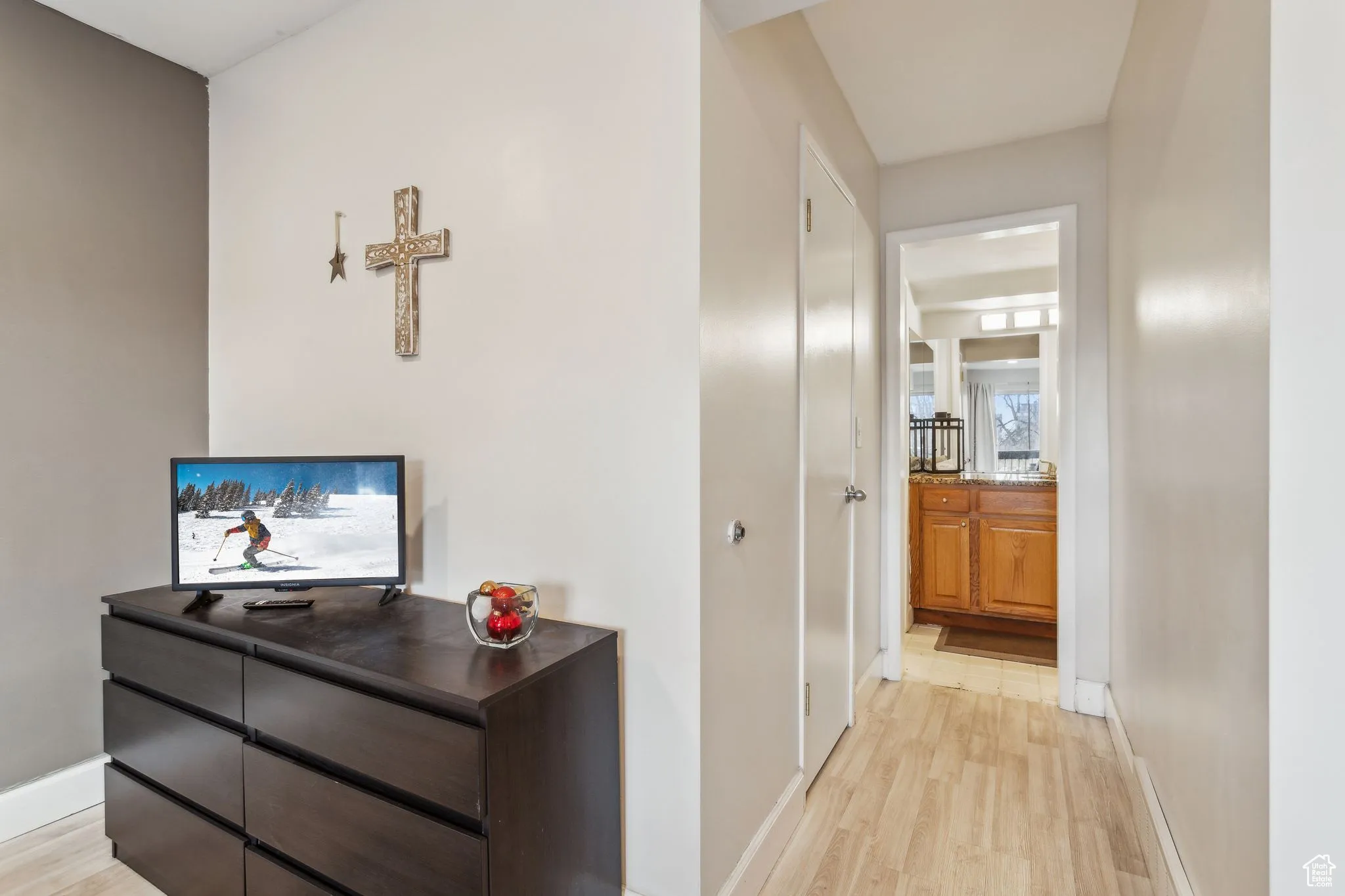 Hall with light wood-style floors