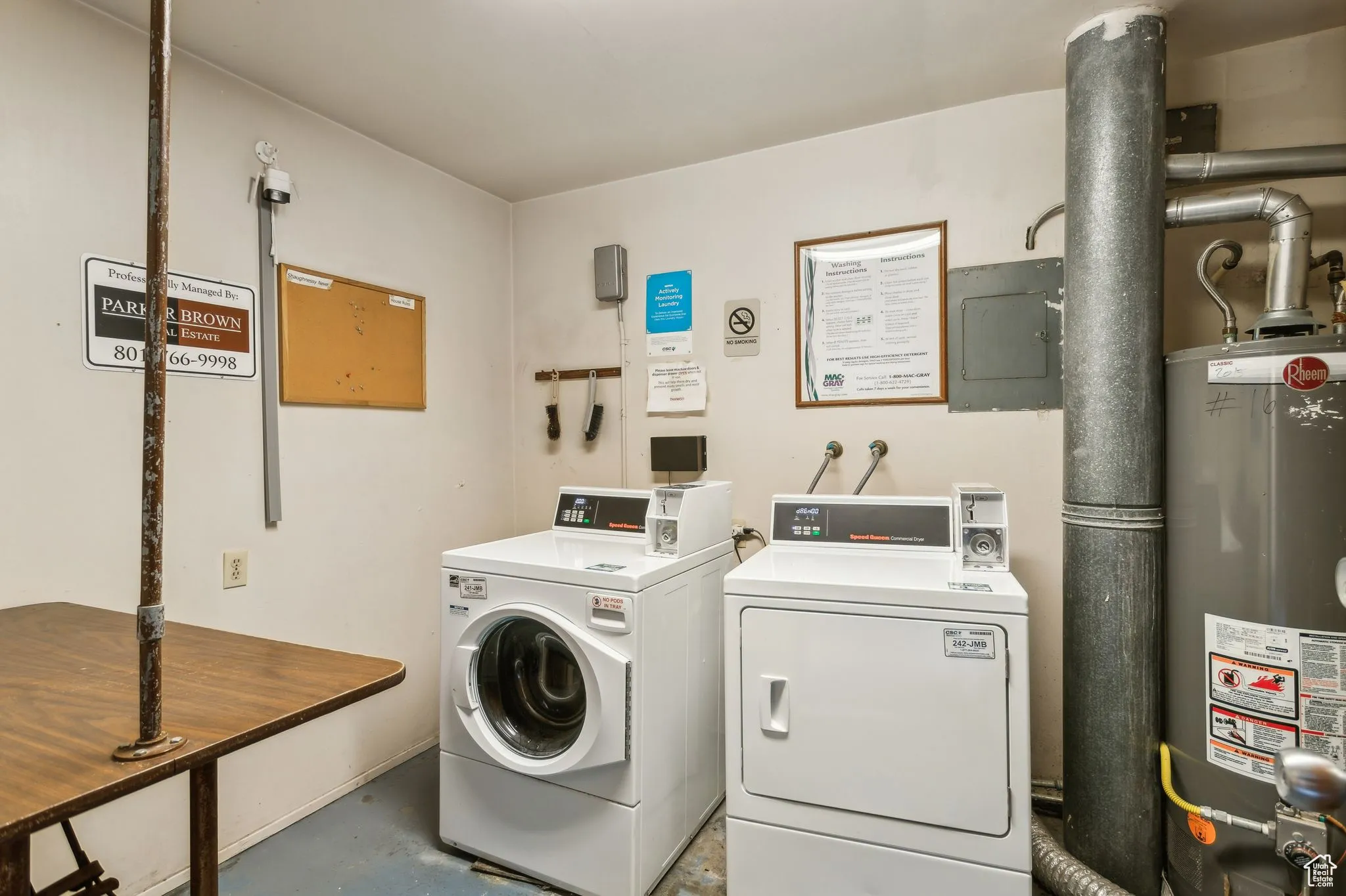 Shared laundry with water heater, independent washer and dryer, and electric panel
