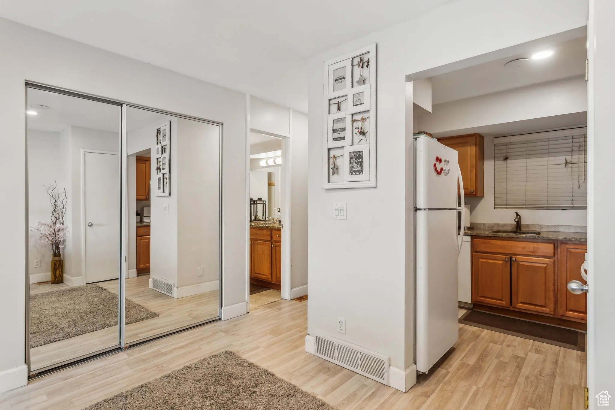 Corridor with light wood finished floors