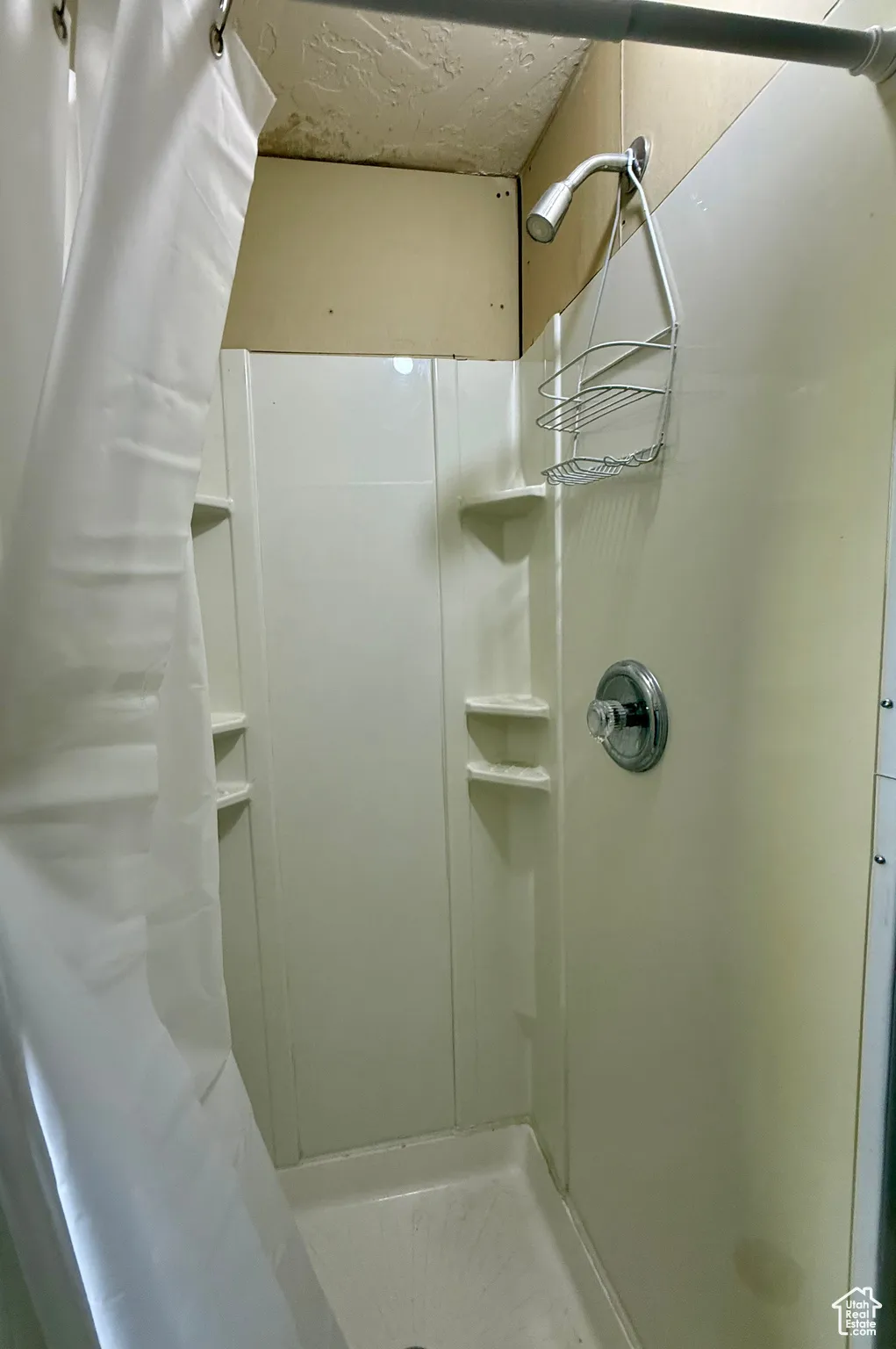 Full bath featuring a stall shower
