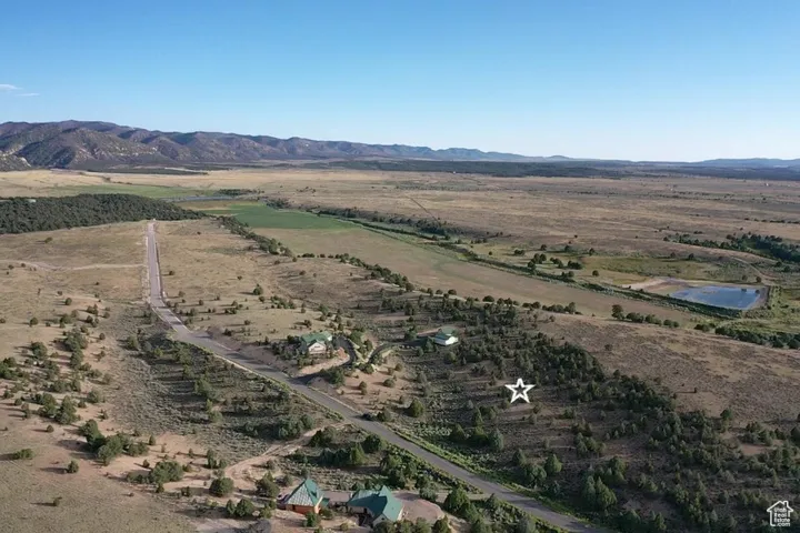 View of property location featuring mountains and rural landscape