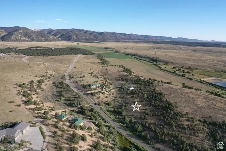 View of property location with mountains and rural landscape