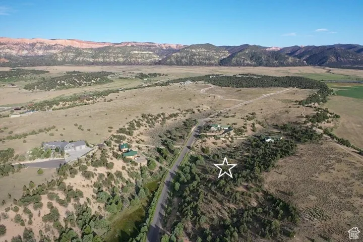 View of property location featuring rural landscape and a mountain backdrop