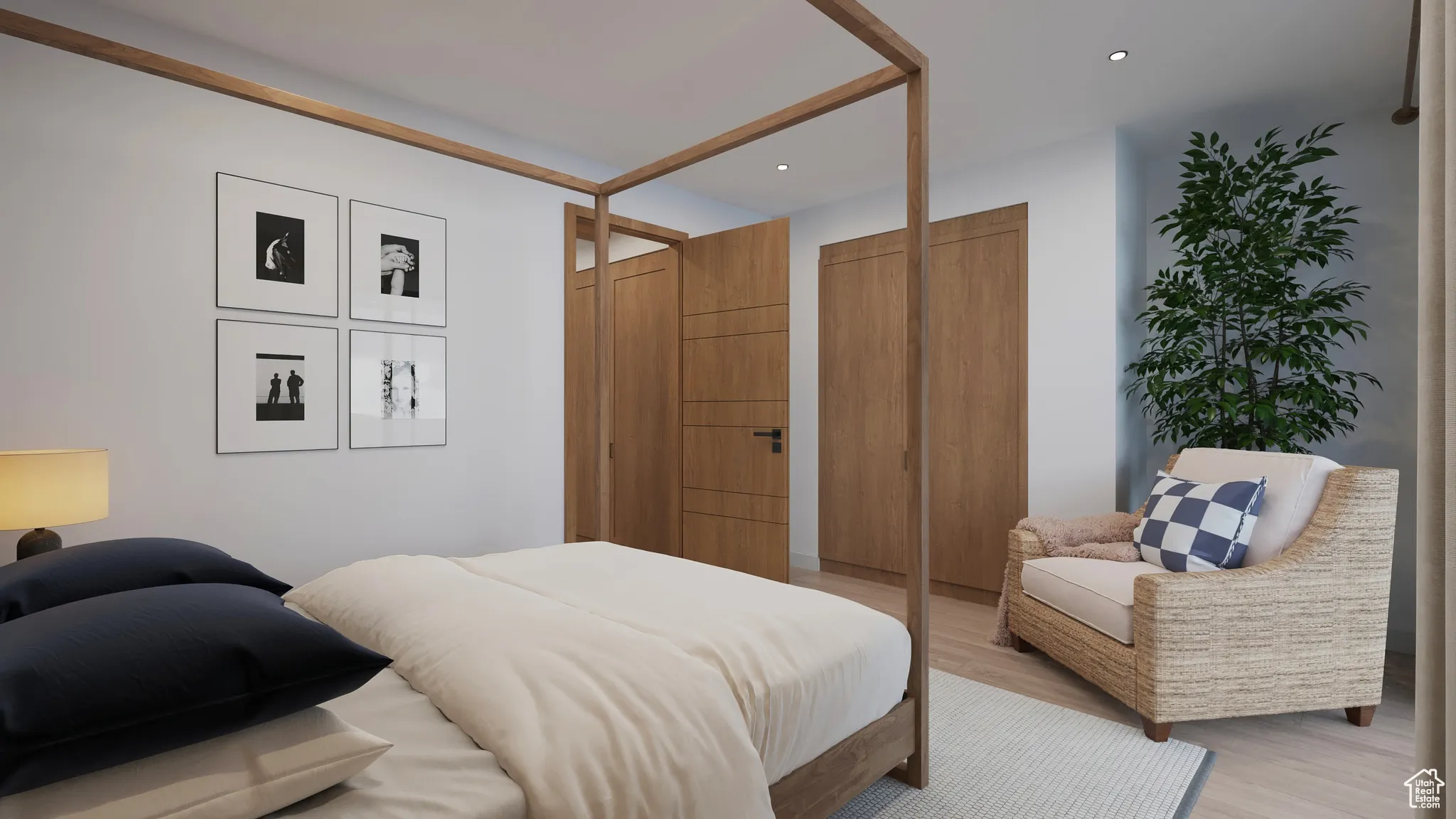 Bedroom with light wood-style floors and recessed lighting