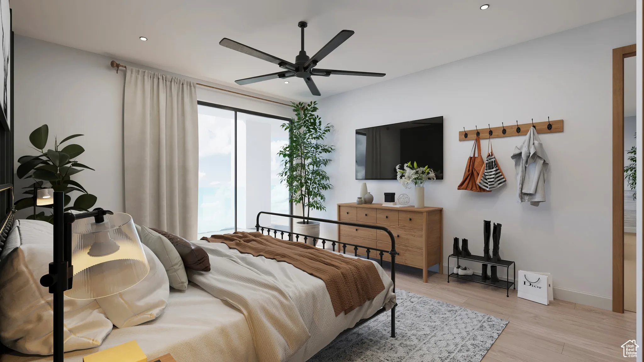 Bedroom with light wood-style floors, recessed lighting, and a ceiling fan